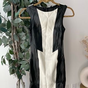 Sleeveless leather trim dress. Never worn.